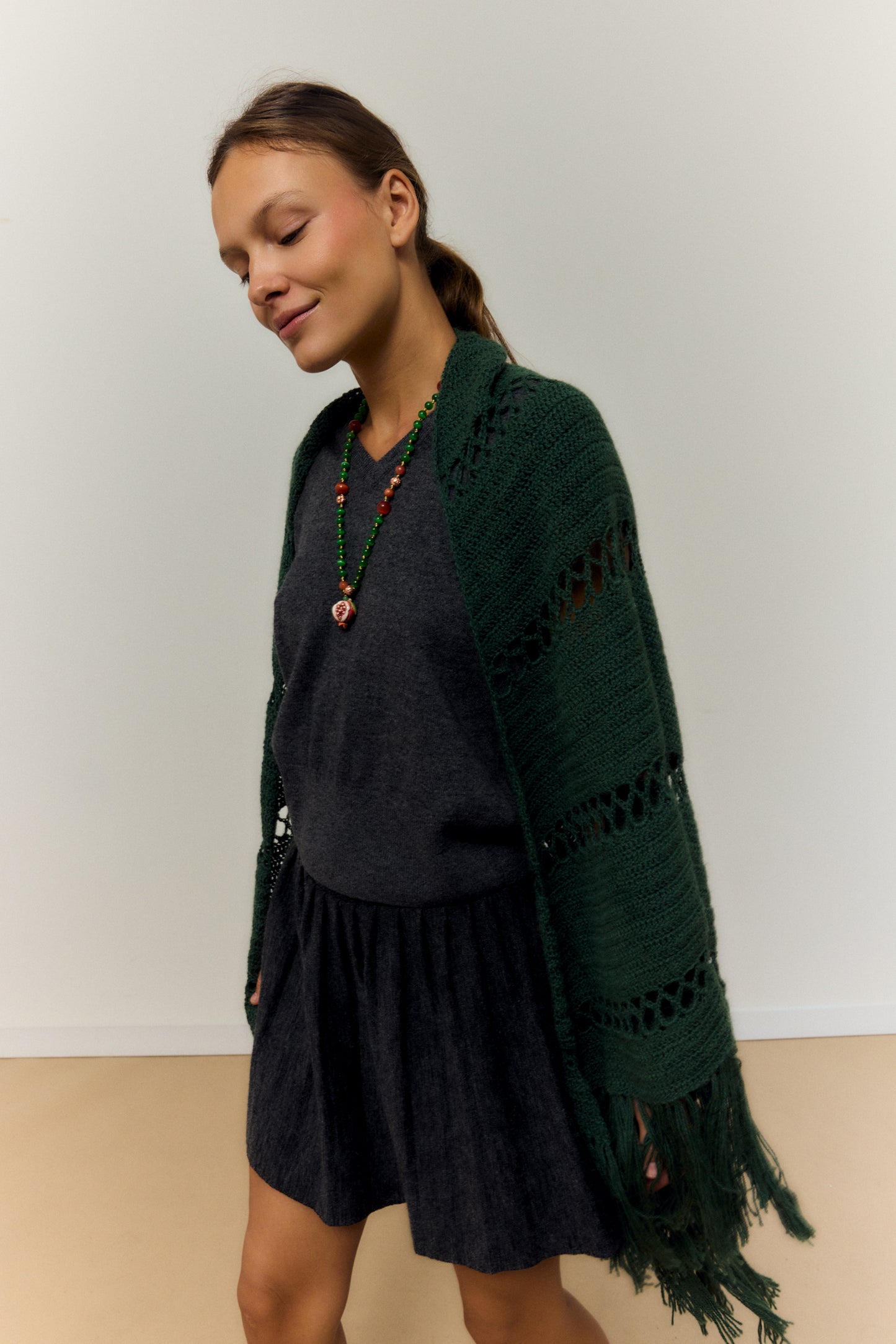 OPEN POMEGRANATE, LONG GREEN AND RED BEAD NECKLACE WITH PIECE OF CERAMIC IN THE SHAPE OF A POMEGRANATE