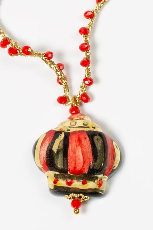 BALTASAR, RED CRYSTAL BEAD NECKLACE WITH HAND-PAINTED CERAMIC CROWN CHARM