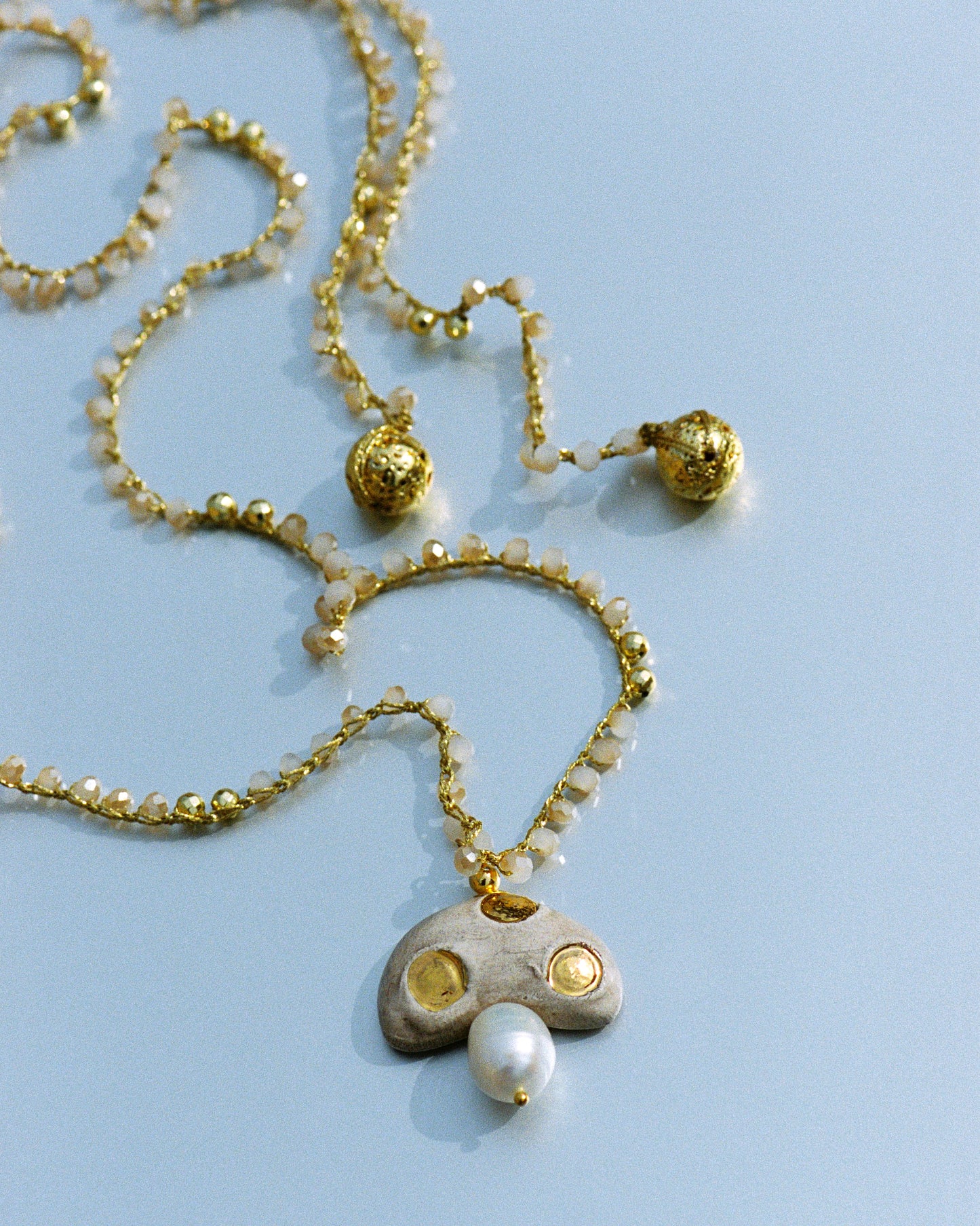 CHAMPI TOPO, LONG CROCHET NECKLACE WITH BROWN MUSHROOM PENDANT