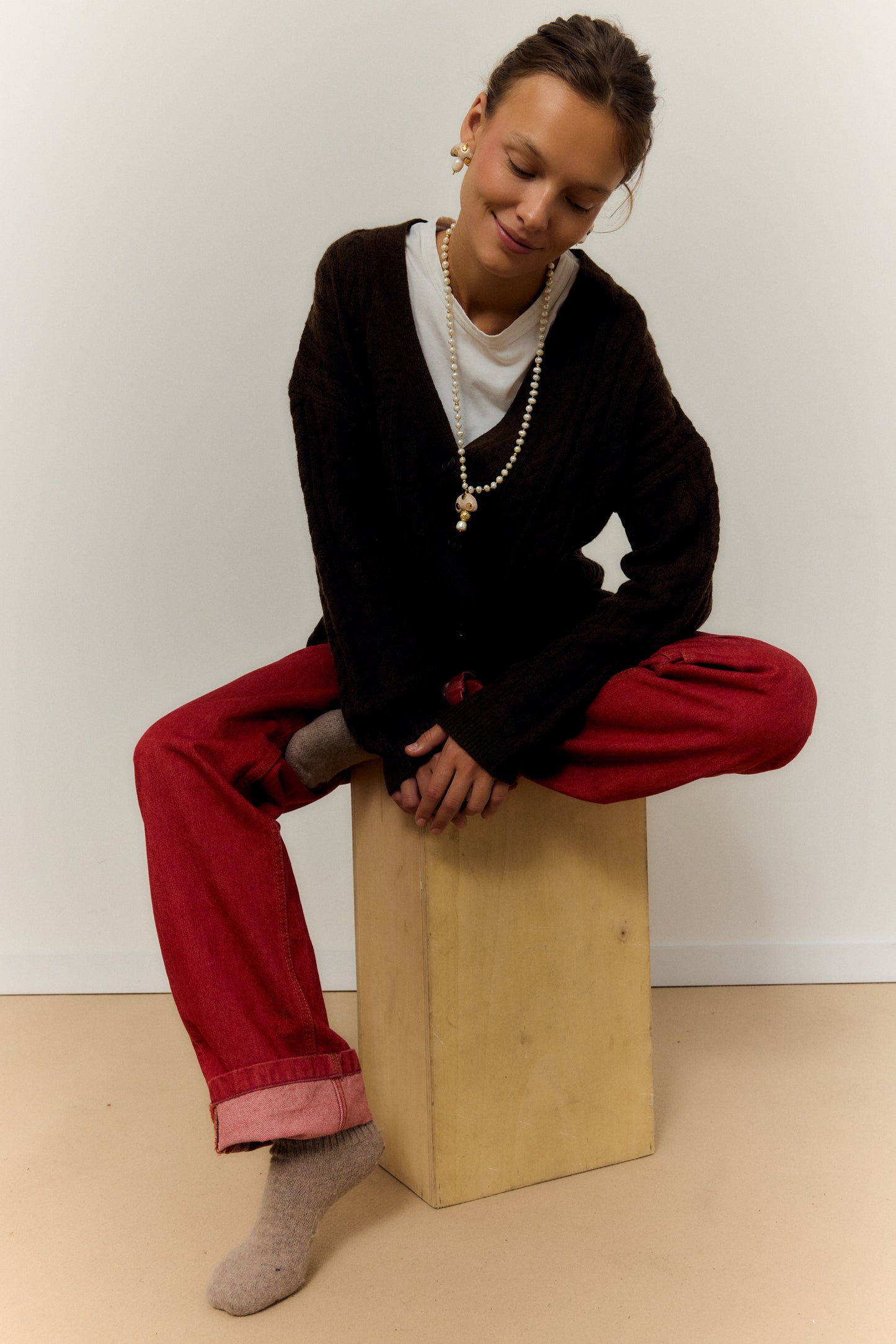 CHAMPI TOPO, LONG PEARL NECKLACE WITH BROWN MUSHROOM PENDANT.