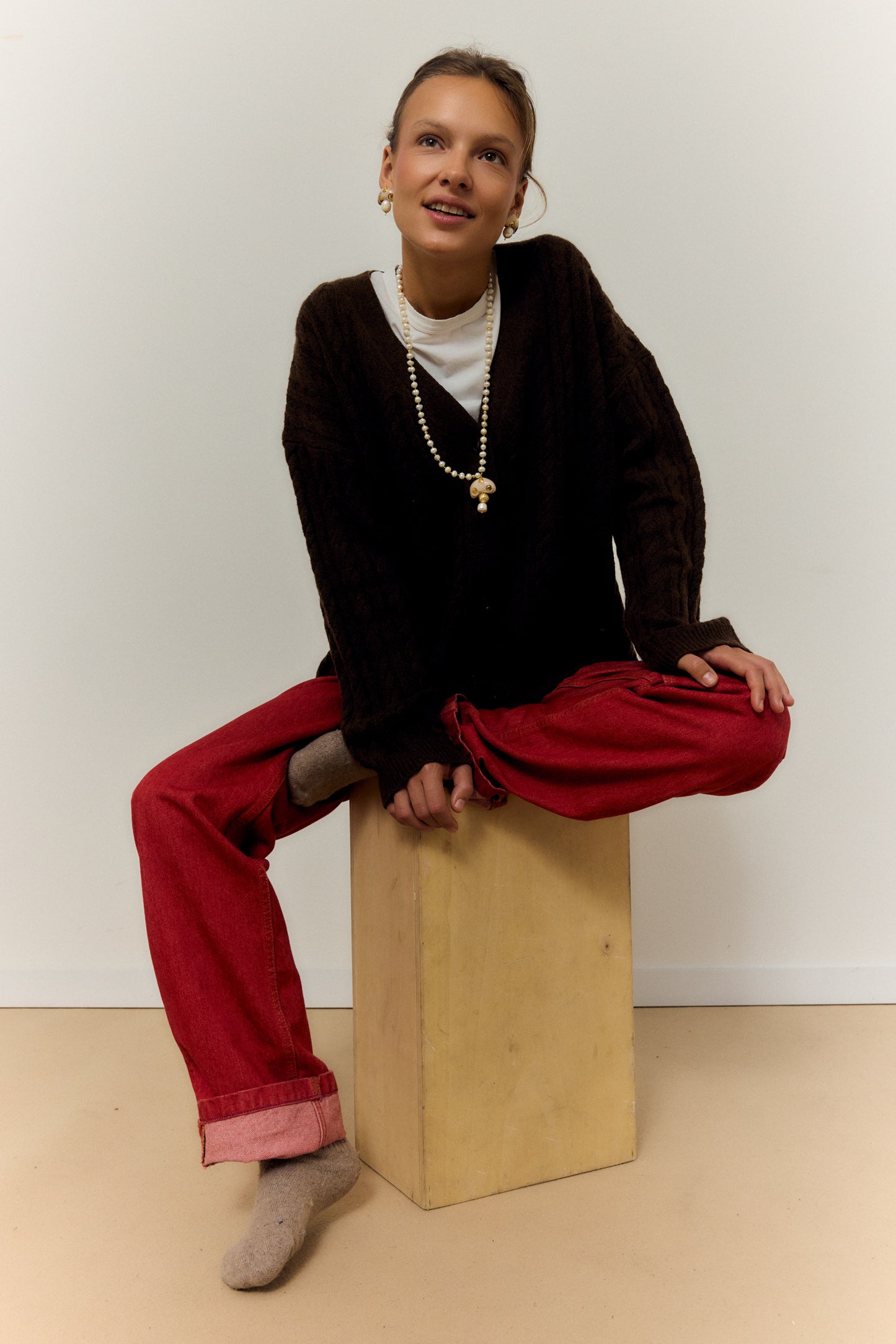 CHAMPI TOPO, LONG PEARL NECKLACE WITH BROWN MUSHROOM PENDANT.