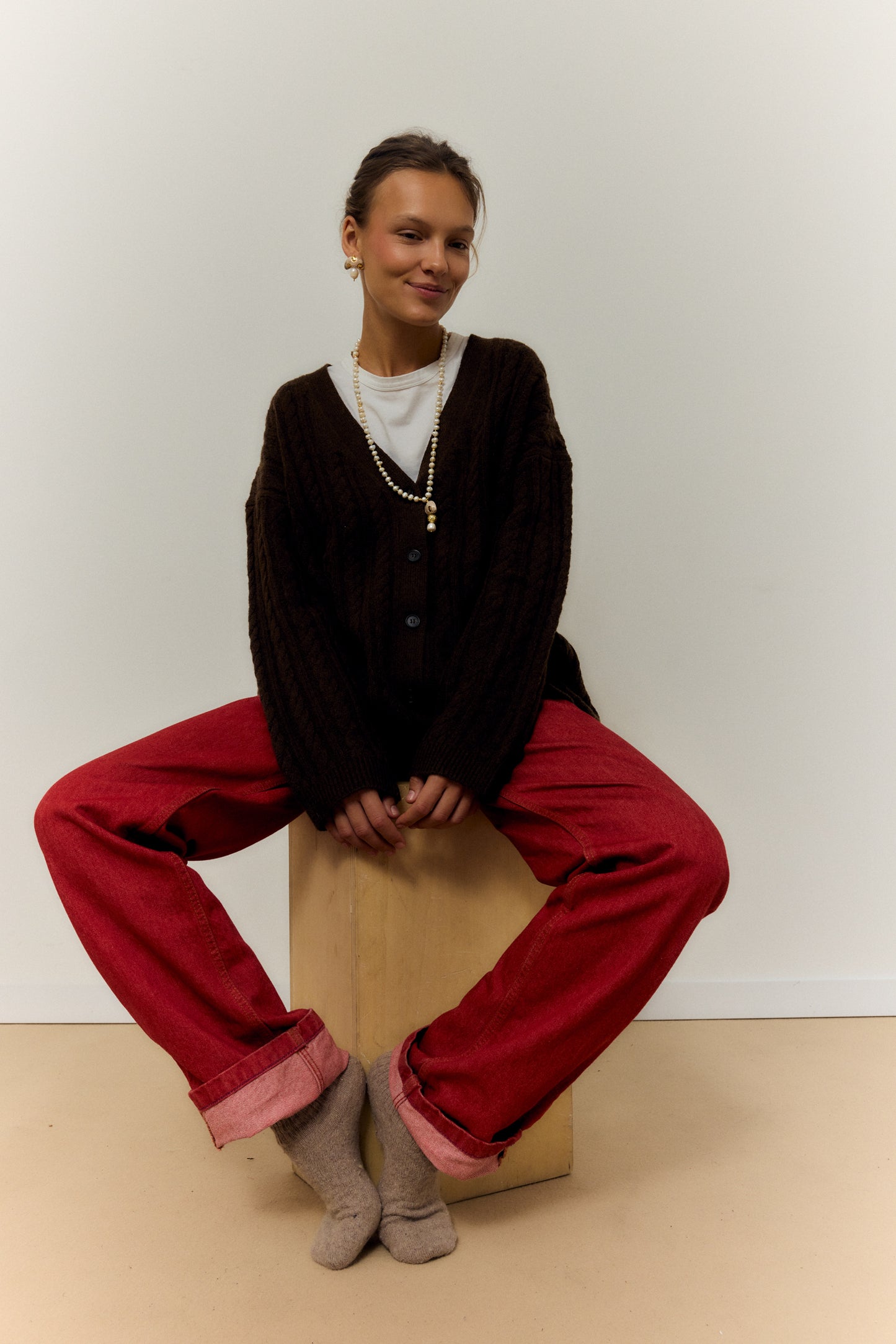 CHAMPI TOPO, LONG PEARL NECKLACE WITH BROWN MUSHROOM PENDANT.