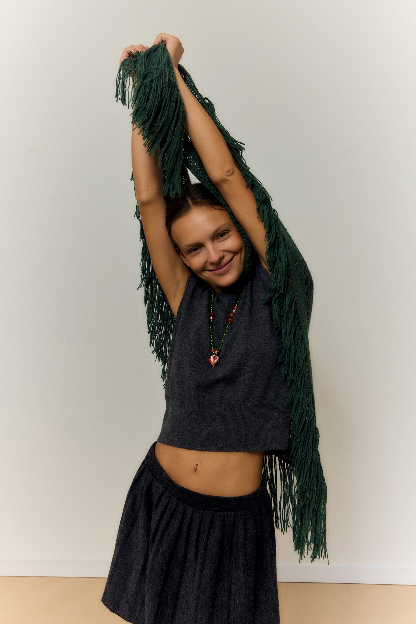 OPEN POMEGRANATE, LONG GREEN AND RED BEAD NECKLACE WITH PIECE OF CERAMIC IN THE SHAPE OF A POMEGRANATE