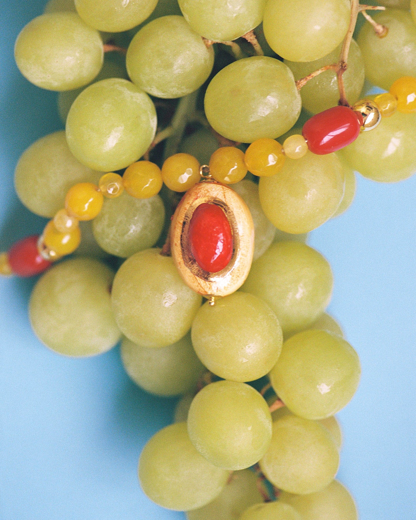 SUNSET GEM, NECKLACE WITH CERAMIC PIECE IN THE SHAPE OF A RED AND ORANGE GEM