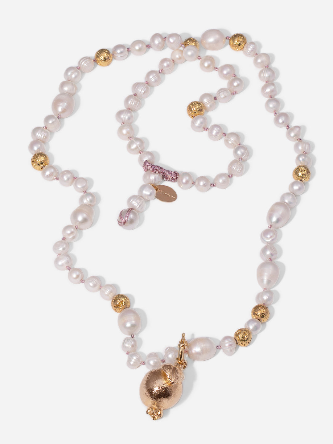 GRANADA DORADA, LONG PEARL NECKLACE WITH BRONZE PIECE IN THE SHAPE OF A GRENADE