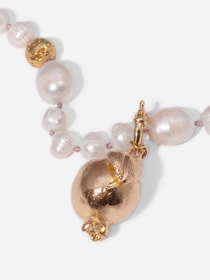 GRANADA DORADA, LONG PEARL NECKLACE WITH BRONZE PIECE IN THE SHAPE OF A GRENADE